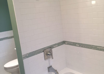 Shower and bathtub with new tile treatment