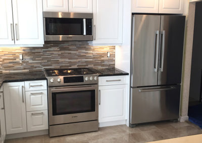 New appliances with custom cabinetry