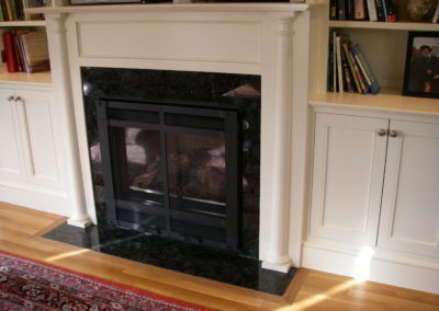 Close up of fireplace, hearth, columns & mantle