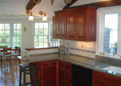 Reconstructed corner with countertop and tile backsplash